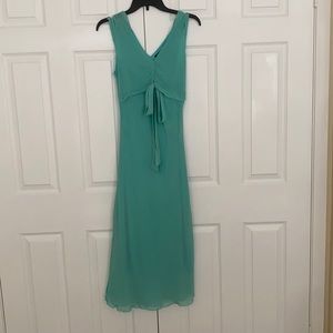 Sleeveless aqua color 100% silk, size 6 prom dress